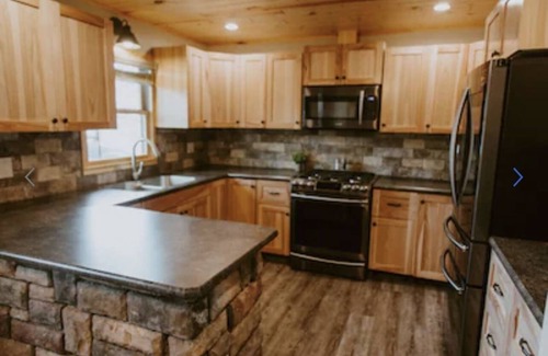 Webster Cabin | Cozy Vacation Cottage on the Lake with Hot Tub!