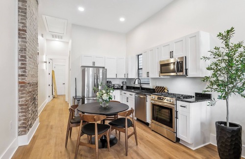 Milan House | Cozy with exposed brick and studio layout all essentials for comfortable stay.