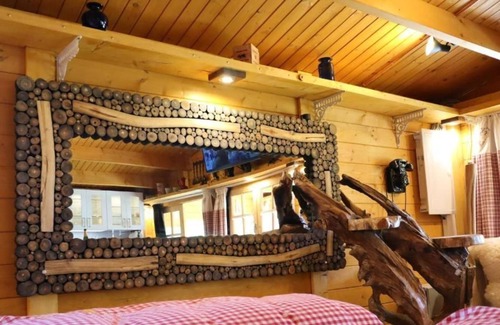 Neufeld House | Cozy wooden cottage quietly situated behind the dike with terrace