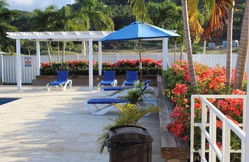 Lucea House | Cozy yet elegant Jamaican vacation home with access to pool, beach, gym etc