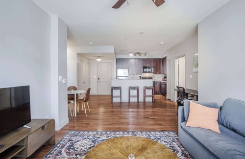Central Business District Apartment | CozySuites at the Banks gym, pool 16