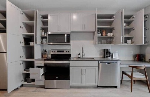 Lower Lawrenceville Apartment | CozySuites l Spacious SDO, Lawrenceville