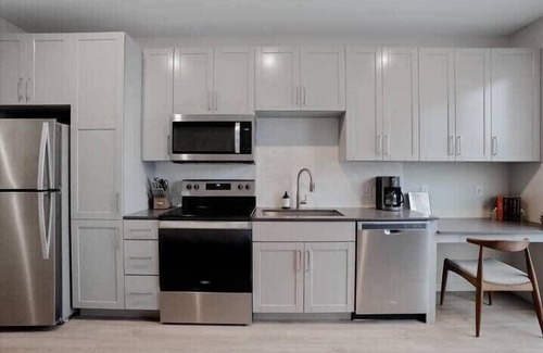Lower Lawrenceville Apartment | CozySuites l Spacious SDO, Lawrenceville