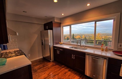 Rainier Valley House | Craftsman With Breathtaking View of Downtown Seattle and Lake Washington