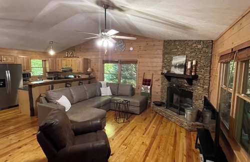 Ellijay Cabin | Creekfront Cabin with Waterfall. Hot Tub, Fire Pit, Gameroom, and more.