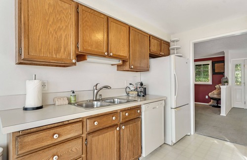 Lacey House | Creekside charmer with kayaks, fireplace, large deck, & W/D - dog-friendly