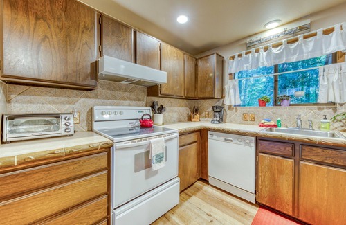 Rhododendron House | Creekside home with hot tub, deck, & great woodland views