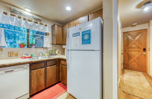 Rhododendron House | Creekside home with hot tub, deck, & great woodland views