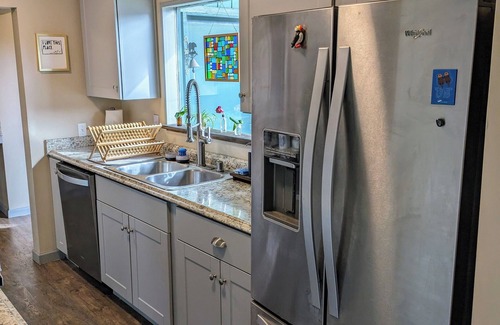 Downtown Anchorage House | Creekside Relaxation near park, downtown, and trails! Hot tub & lots of space