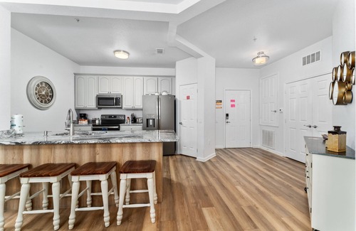 Florida Central Atlantic Coast Condo | Crisp &Modern with Balcony next to the Orange County Convention Center-Sea World