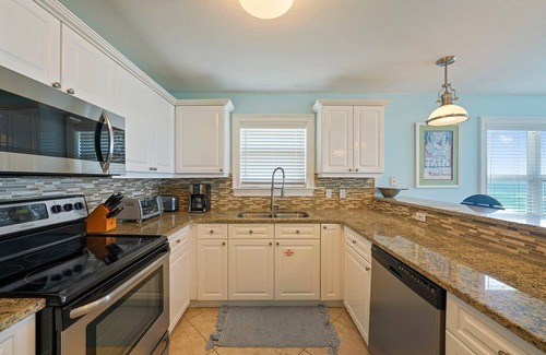 Crystal Beach Condo | Crystal Dunes 401 - Ocean Front Condominium with Pool & Includes Beach Chairs