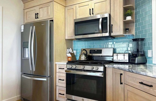 Lake Township House | Crystal Lake Hillside with Private Sandy Beach and Hot Tub!