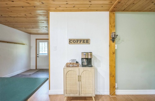 Paris House | Crystal Rapids Retreat: Cozy Up to Autumn's Beauty on the Muskegon River.