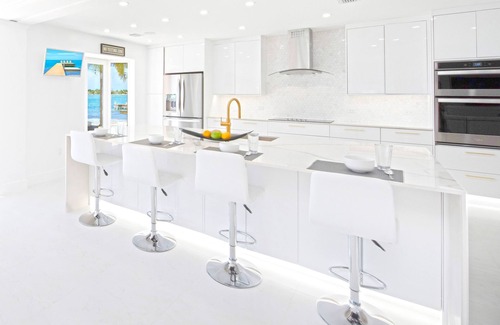 Rum Point House | Crystal Waters: Luxe Villa w/Private Pool, Dock and Barefoot Beach Lounge - Walk to The Kaibo!