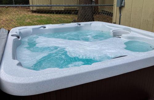 Sugarloaf House | Cub's Cabin ~ Alpine retreat with private hot tub, enclosed yard & wood fireplace