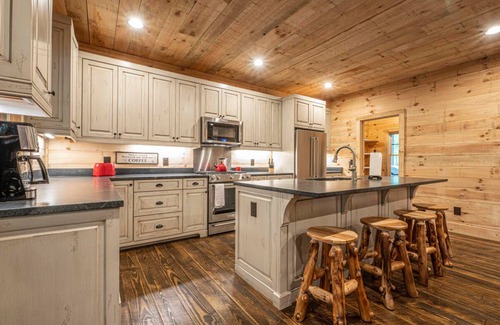 Ellijay Cabin | Custom built mountain house on trout stream with tons of privacy & hot tub.