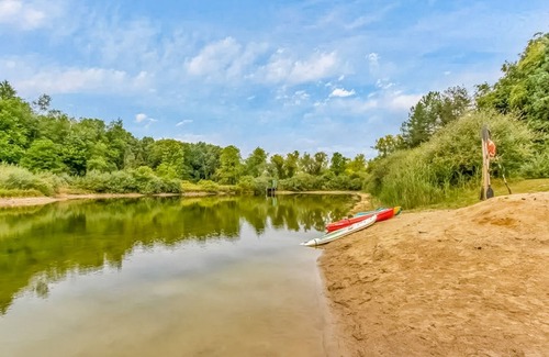 Metamora House | Custom dog-friendly home with private swimming area, fireplace, gym, grill, deck
