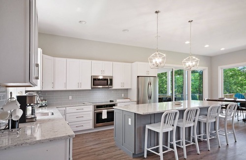 Bumpass House | Custom lakefront home with private beach, dock & firepit