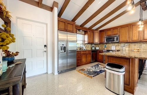 Whitney Beach House | Cute canal front Cottage with dock & boat lift and pool ,short walk to the beach