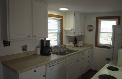 Pinckney House | Cute little cottage by Little Portage Lake, Portage Chain of Lakes, Pinckney Mi.