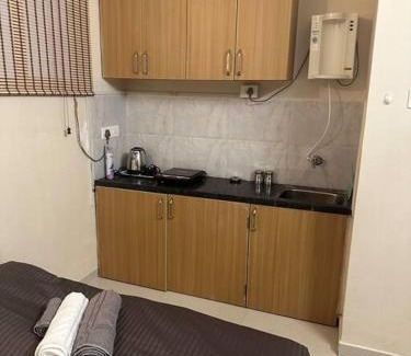 Koregaon Park Apartment | Cute Little Room in Koregaon Park WiFi AC Kitchenette