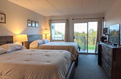 Weirs Beach Apartment | Cute Lower Level Cedar Lodge Room with Balcony & Lake Views!