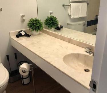 Weirs Beach Apartment | Cute Lower Level Cedar Lodge Room with Balcony & Lake Views!