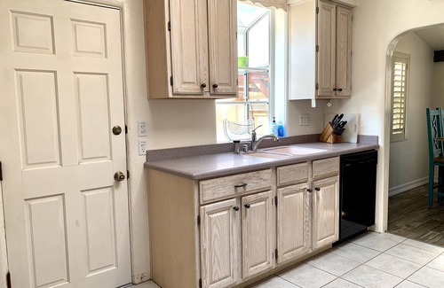 Crown Point House | Cute Spanish Bungalow - BBQ, Firepit, Bikes, Boards, and a Great Patio!