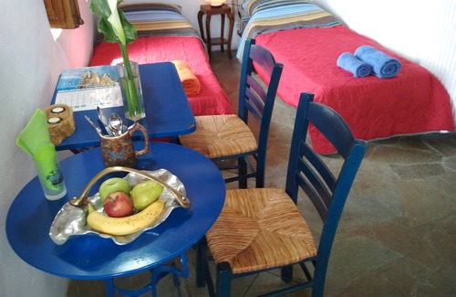 Pitrofos House | Cyclades Olive Museum's Guest House with free 1 h tour to the Olive Museum.