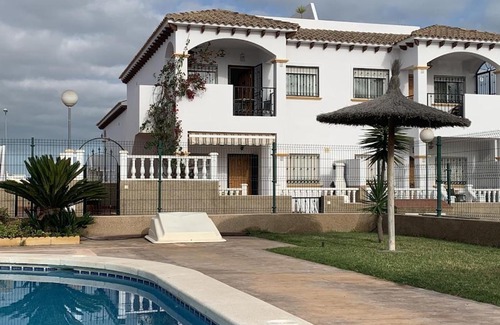 Orihuela Costa Apartment | Daar al Banaat Two bedroom apartment with a roof terrace
