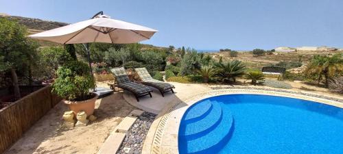 Kercem House | Dar Ta' Xmun - idyllic farmhouse with pool, garden, seaview & sunset