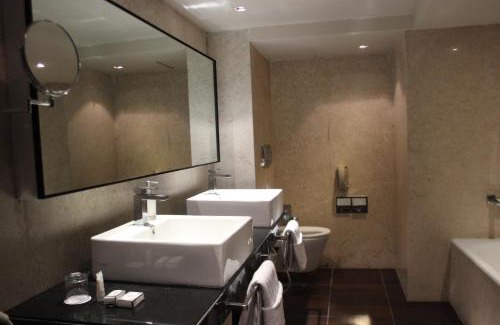 Koramangala Hotel | Davanam Sarovar Portico Suites