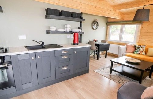 Donegal Cottage | DAVEY JOHNS FORGE CABIN 2, pet friendly in Carrigart, County Donegal