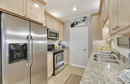 Galveston Condo | Dawn 916-Hook, Wine & Sinker | First Floor, Patio