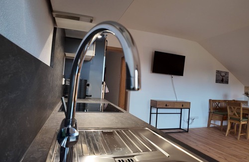 Prien am Chiemsee Apartment | Day courtyard new build apartment
