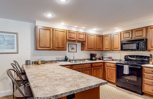 Ellsworth Apartment | Daylight basement apartment with firepit, grill, & washer/dryer - dog-friendly