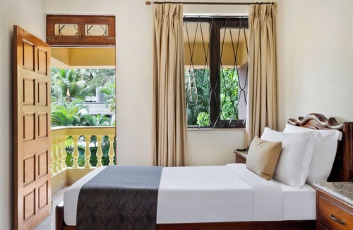 Candolim Hotel | De Mandarin Beach Resort Suites & Villas