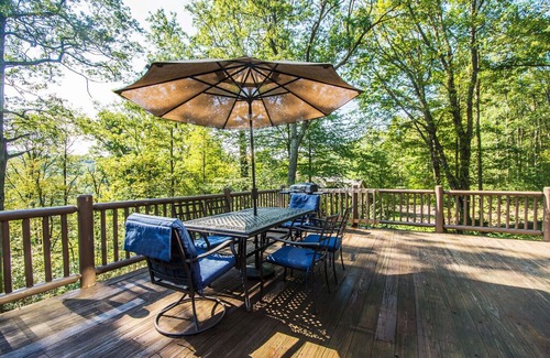 North Glade Hills House | Deep Sigh: Lake Front Log Home with a Hot Tub