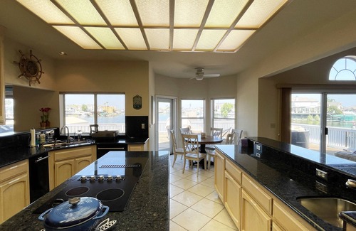 Discovery Bay House | Deep Water Boat House with Sunset View