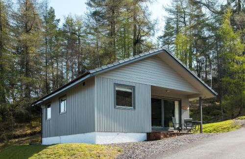 Crianlarich Ski Chalet | Deerstalker Lodge cozy lodge with wood burner