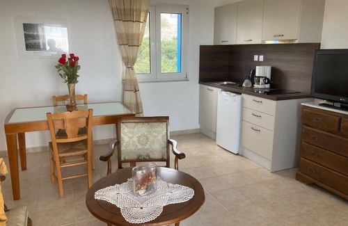 Syros Apartment | Delagratsia: Appartement in a house and big garden, breathtaking sea view