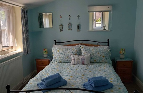 Briston House | Delightful, dog-friendly, peaceful accommodation for two with off-road parking.