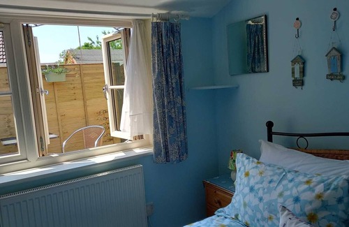 Briston House | Delightful, dog-friendly, peaceful accommodation for two with off-road parking.