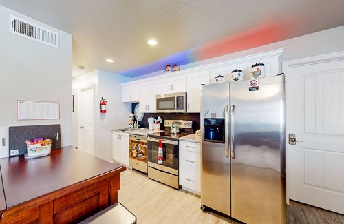 Hurricane House | Delightful lower-level getaway with a full kitchen, plus patio & pool access