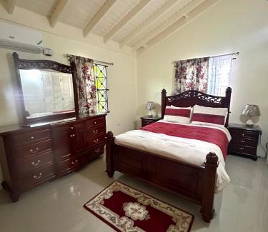 Mammee Bay Apartment | Dell's Exotic Haven, 2 bedrooms, 2 baths, pool, gym