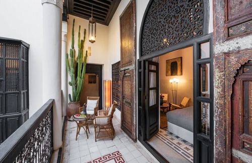 Bab Doukkala Villa | Deluxe Room Key Hook – Interior Courtyard View