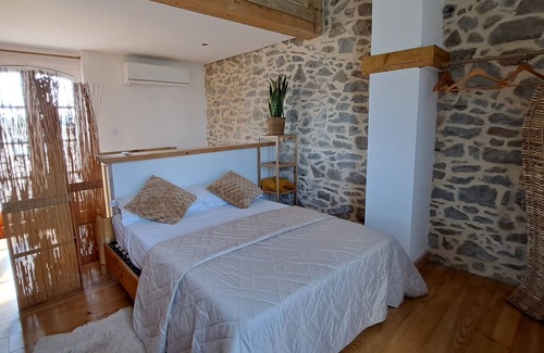 Homps Apartment | Deluxe room with views over the Canal du Midi in Homps.