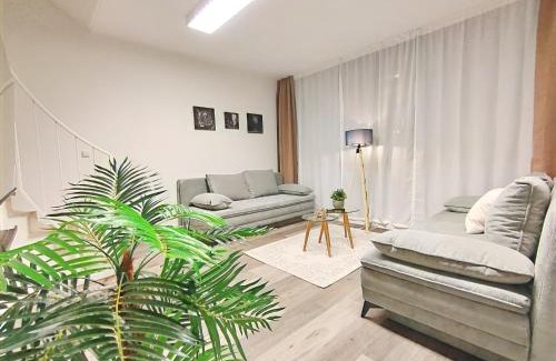 Mitte Apartment | Design-Apartmenthaus für bis zu 12, modern, Dachterrasse, Grill, ruhige Lage, Disney plus, Wii, LAN und WLAN
