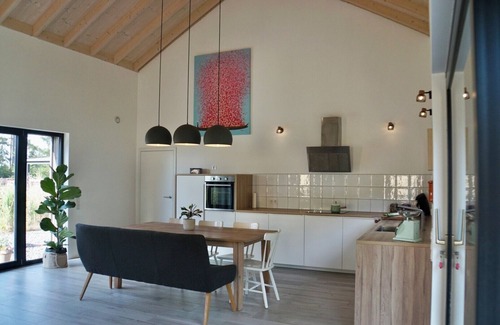 Breitscheid Villa | Design home with large fenced natural garden & fireplace