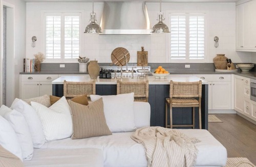The Strand House | Designer 4-bedroom house in the heart of Downtown MB!